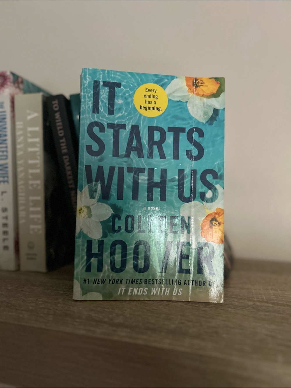 It Starts With Us by Colleen Hoover - Teal Floral Paperback